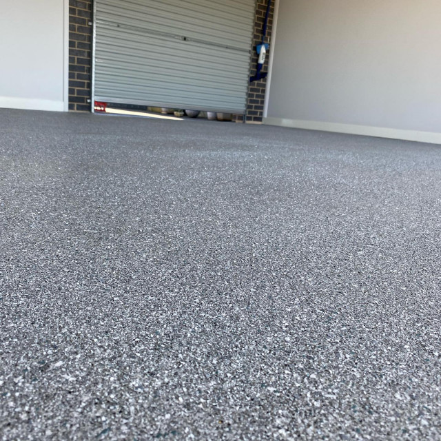 Epoxy coating will transform any garage space. Easy to clean and maintain